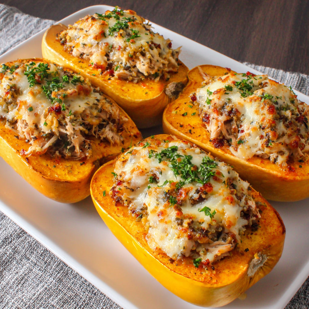 A plate of food with chicken and cheese.