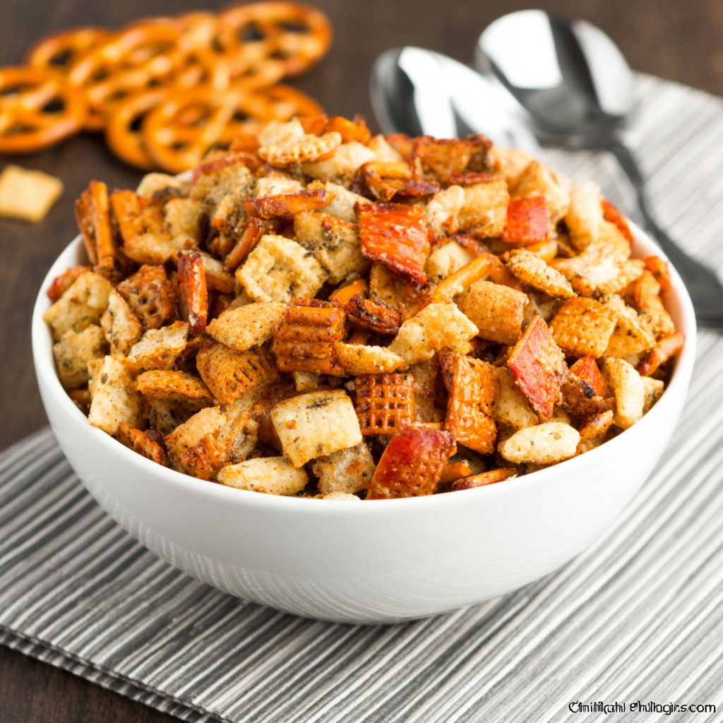 A bowl of crunchy food with a spoon in it.