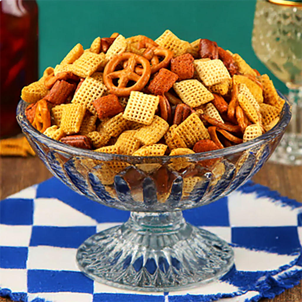 A bowl of chips with a glass bowl.