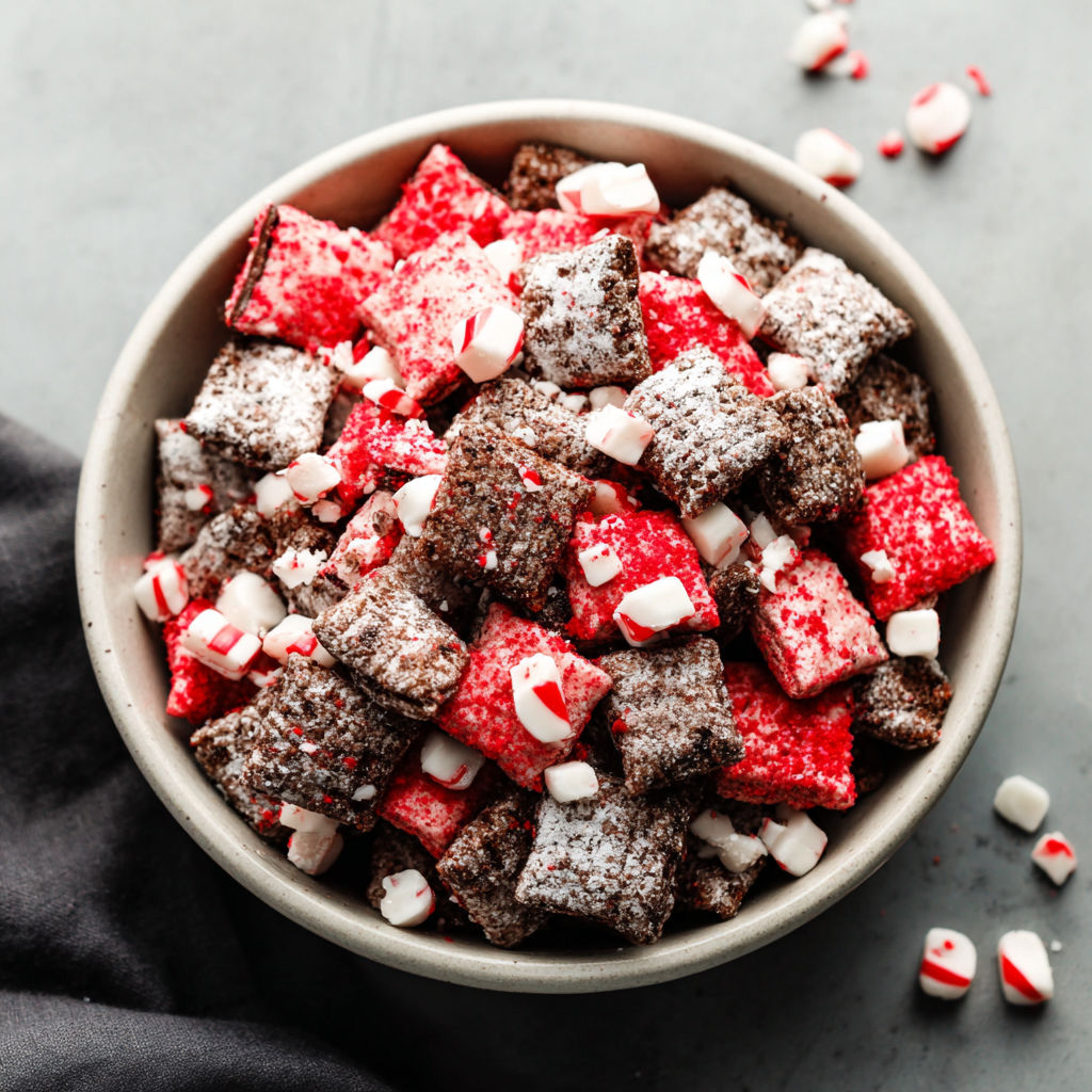 A bowl of candy with red and white stripes.