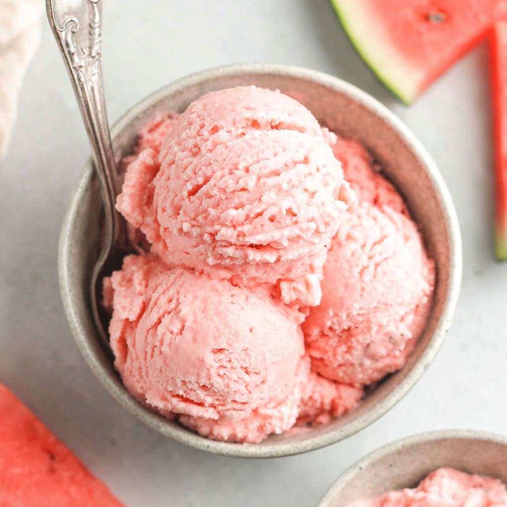 A bowl of pink ice cream.