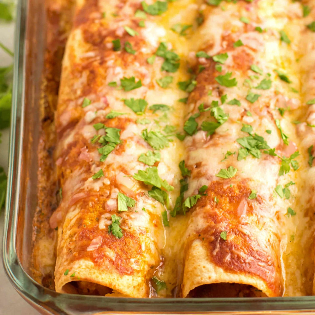 A dish of food with a green topping.