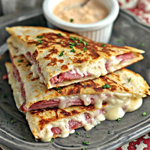 A recipe for a sandwich with meat and cheese.