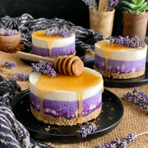 A slice of cake with honey drizzled on top.