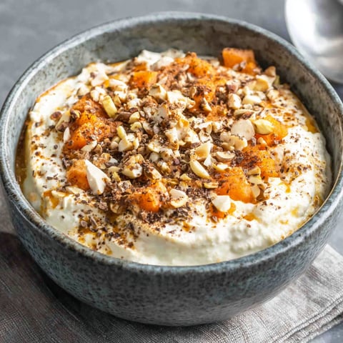 A bowl of food with a recipe on the side.