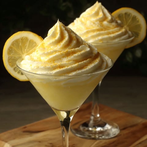 Two glasses of lemon meringue pie.