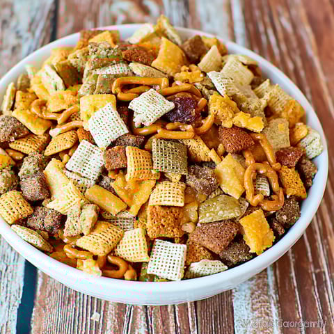 A bowl of snacks on a table.