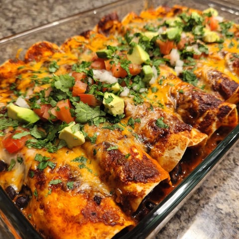 A dish of Mexican food with a variety of ingredients.